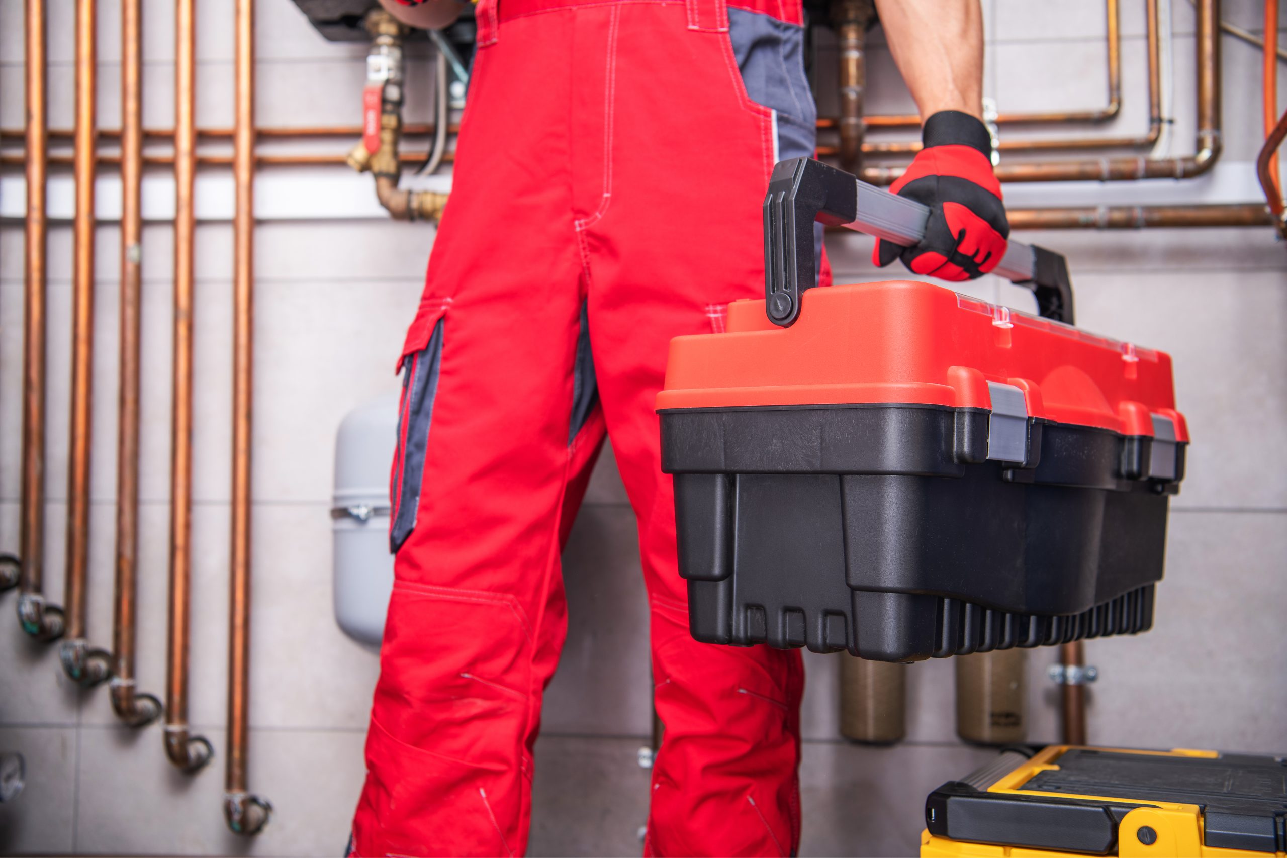 HVAC Warranty Home Call Service Worker with His Tools Box